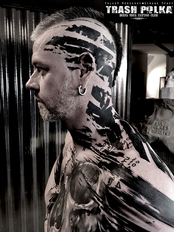 trash polka tattoo a english man with bold head tattoo