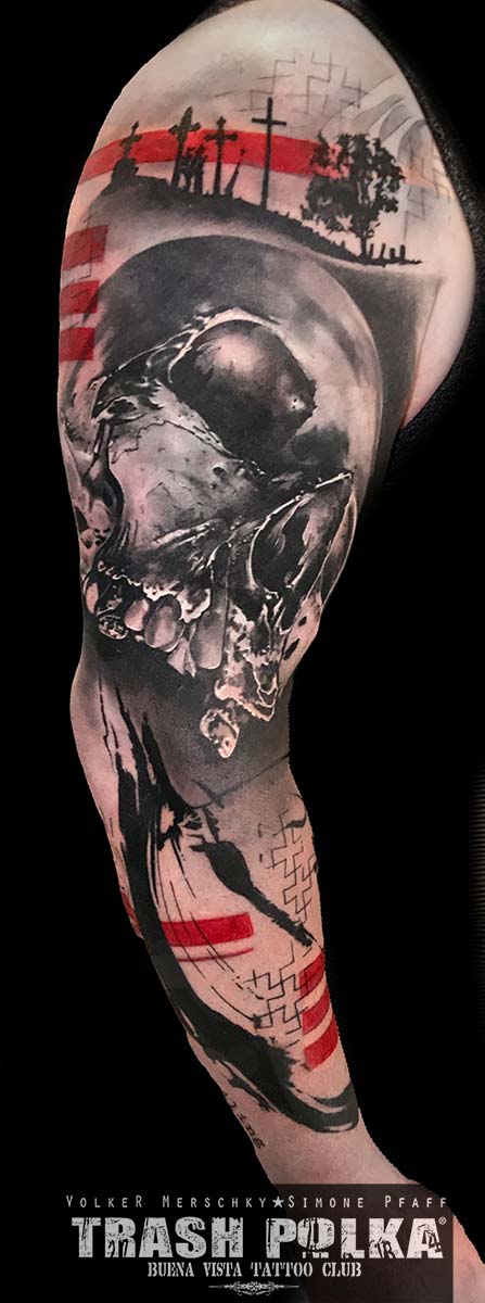 trash polka tattoo full arm on top little crosses big realistic skull and graphic pattern brushstroke art