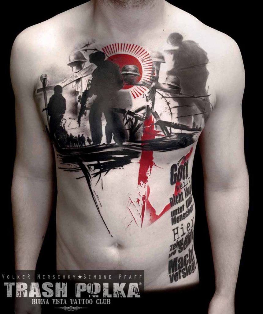 trash polka tattoo on the front body of a man with red and black ink margin soldiers and a red sun and german lyrics