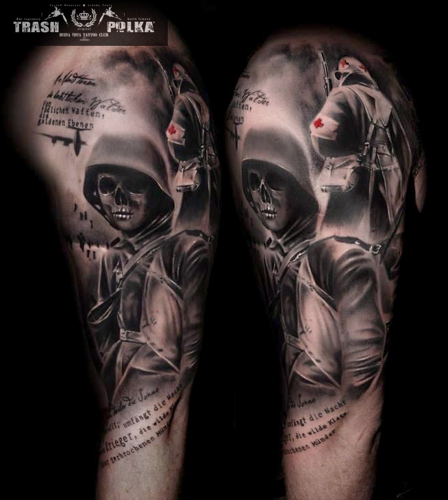 trash polka tattoo upper arm with a ww2 scene a soldier with skull face and a red cross soldier in the background combined with writing and little bombs