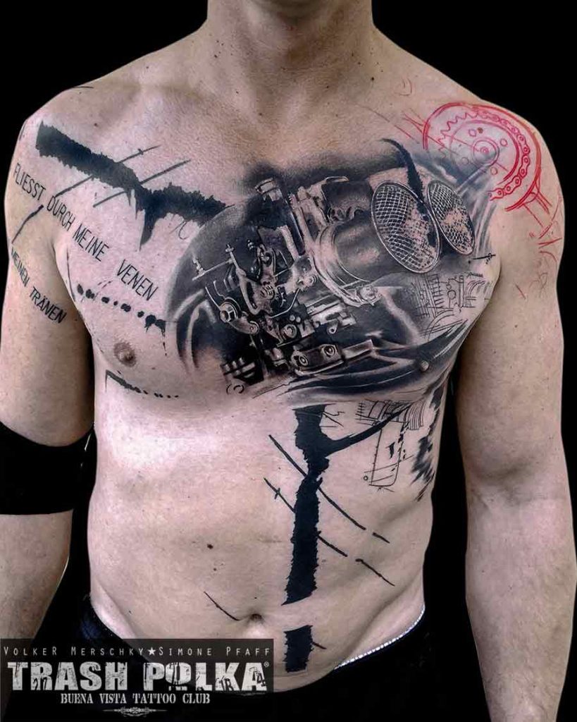 trash polka tattoo on men chest shows a weber carburetor