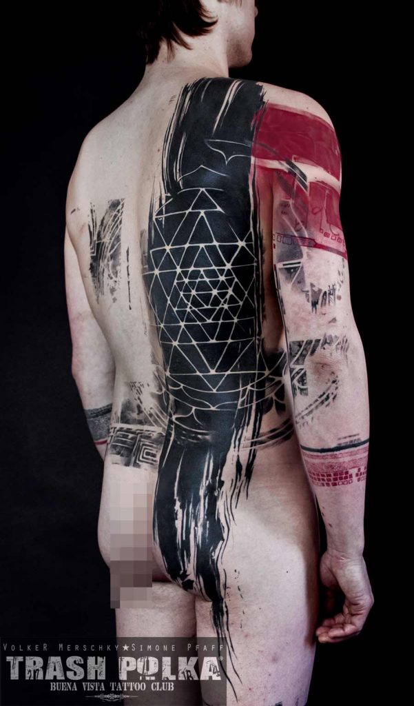 a trash polka back tattoo shows futuristic triangles space freedom belief