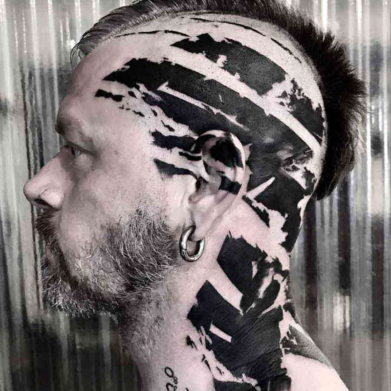 the pic show a radical trash polka head tattoo sumi ink style or brush stroke calligraphy